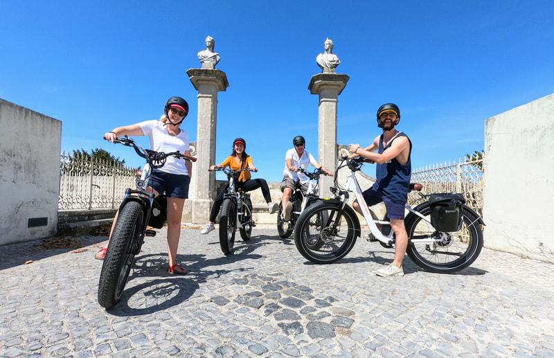 Group of friends on an Ebike tour at Seteais palace in Sintra